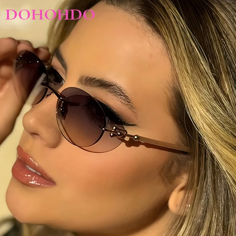 

2025 Popular Brand Designer Oval Rimless Metal Women Sunglasses Trend Classic Men Shades Outdoor Driving Travel Sunglasses UV400