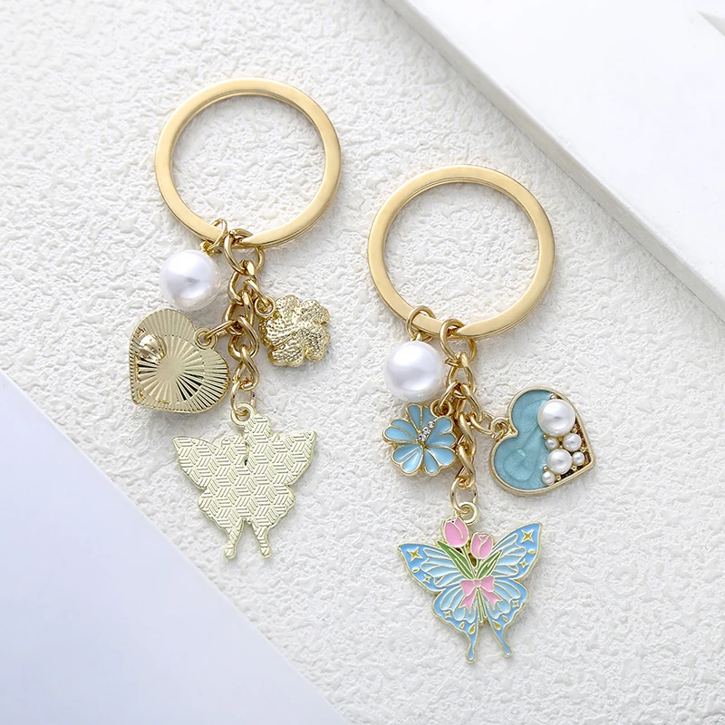 Oil-dropping Lake Blue Butterfly Flower Love Pendant High-grade Keychain Pendant Buckle Small Ornaments