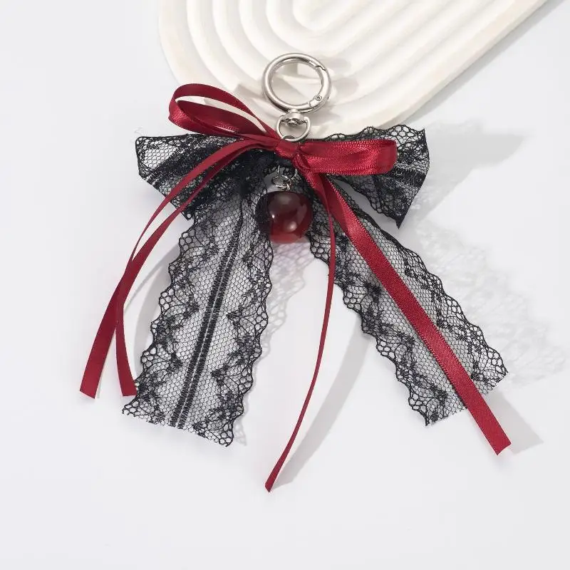 هدية لطيفة على شكل سلسلة مفاتيح لعيد الحب - قوس دانتيل مع سلسلة لؤلؤية وسحر نجمة. إكسسوار حقيبة شريط الباليه للنساء