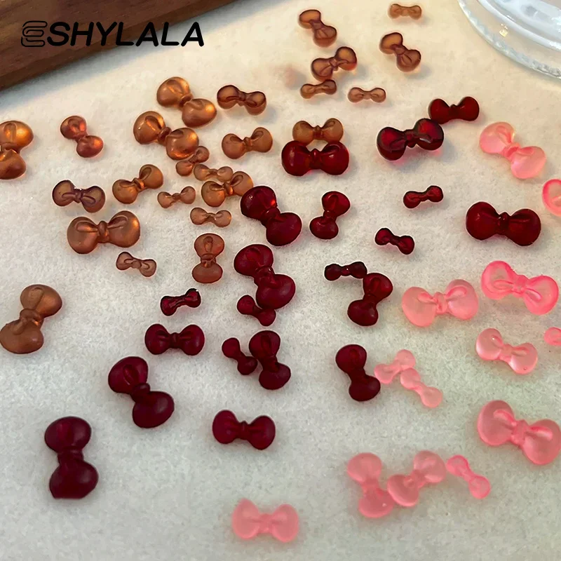 50個入り 冬のリボン 3Dネイルアートアクセサリー 可愛い蝶ネクタイネイルデコレーション DIYレジンネイルチャームミックスパーツ