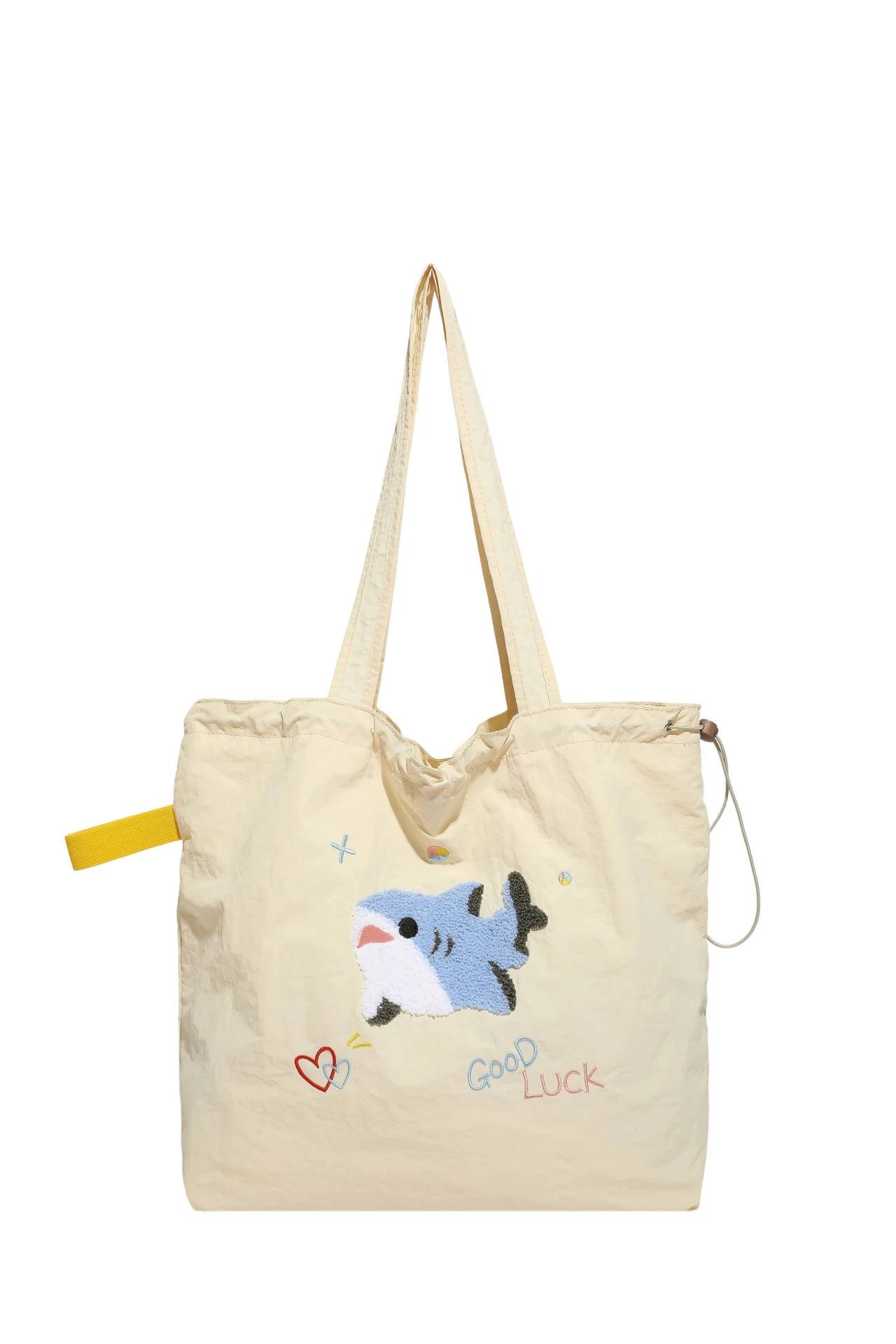 

Handbags. Original niche design cartoon embroidery nylon canvas bag female large capacity cute lazy wind one-shoulder tote bag.