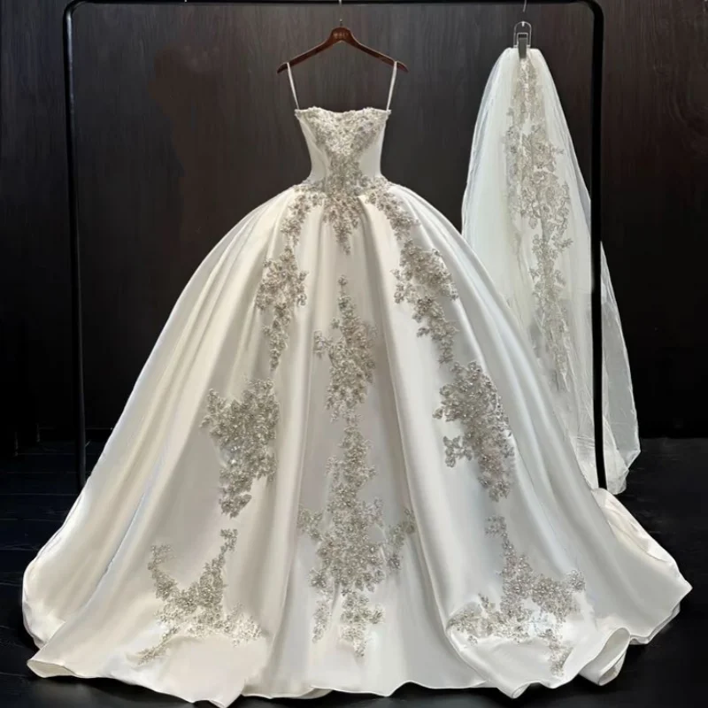 

Luxury Satin Spaghetti Strap Ball Gown Wedding Dress 2026 Elegant Beaded Bridal Gown Plus Size Vestido De Novia Custom