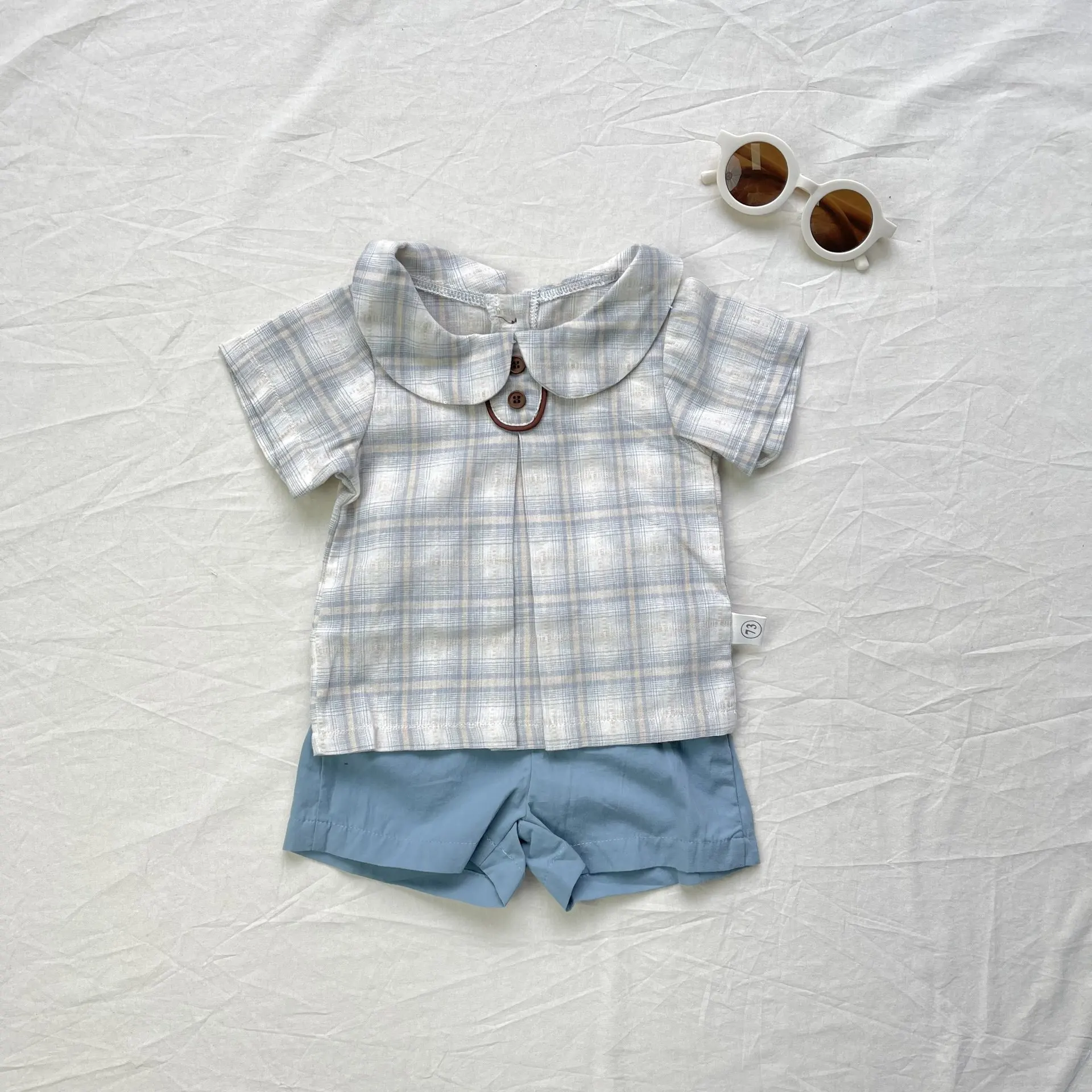 

Детский летний комплект для малышей: милый клетчатый топ с отложным воротником и шорты, 2 предмета, хлопок, новинка 2026 года