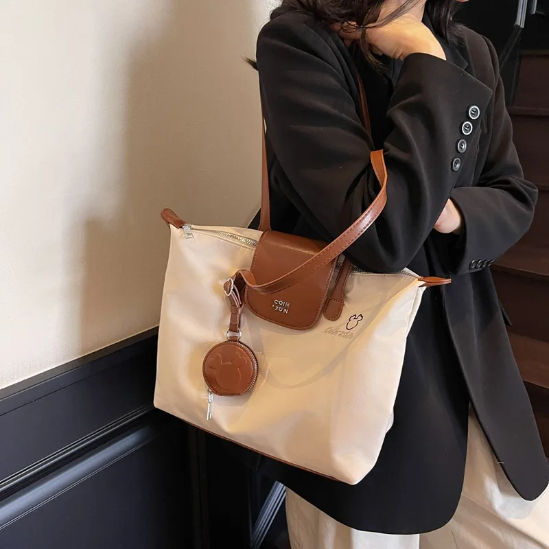 

2025 Dumpling Tote Bag for Women Spacious Nylon Shoulder Purse Adjustable Crossbody Strap with Top Handle Work to Weekend Bag