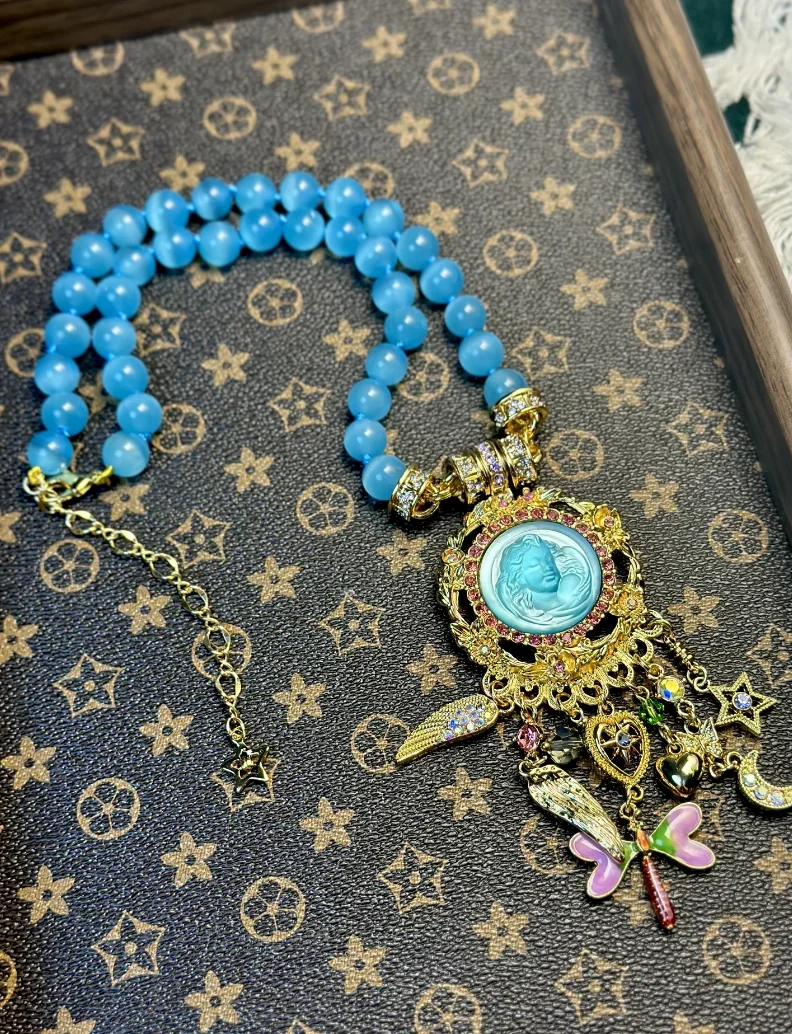 KF Europe and the United States Fashion Trend Sweet Fresh Blue Cat's Eye Stone Chain Lovely Dynamic Sleep Angel Dragonfly Star T