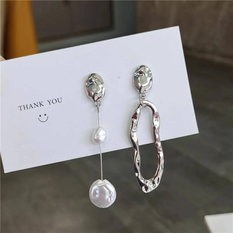 Elevate Your Style with These Stunning Asymmetric Pearl Earrings – Only .03!