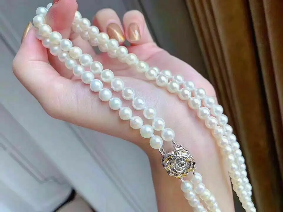 20-inch double-strand AAAA 7-8mm round natural South China Sea white pearl necklace