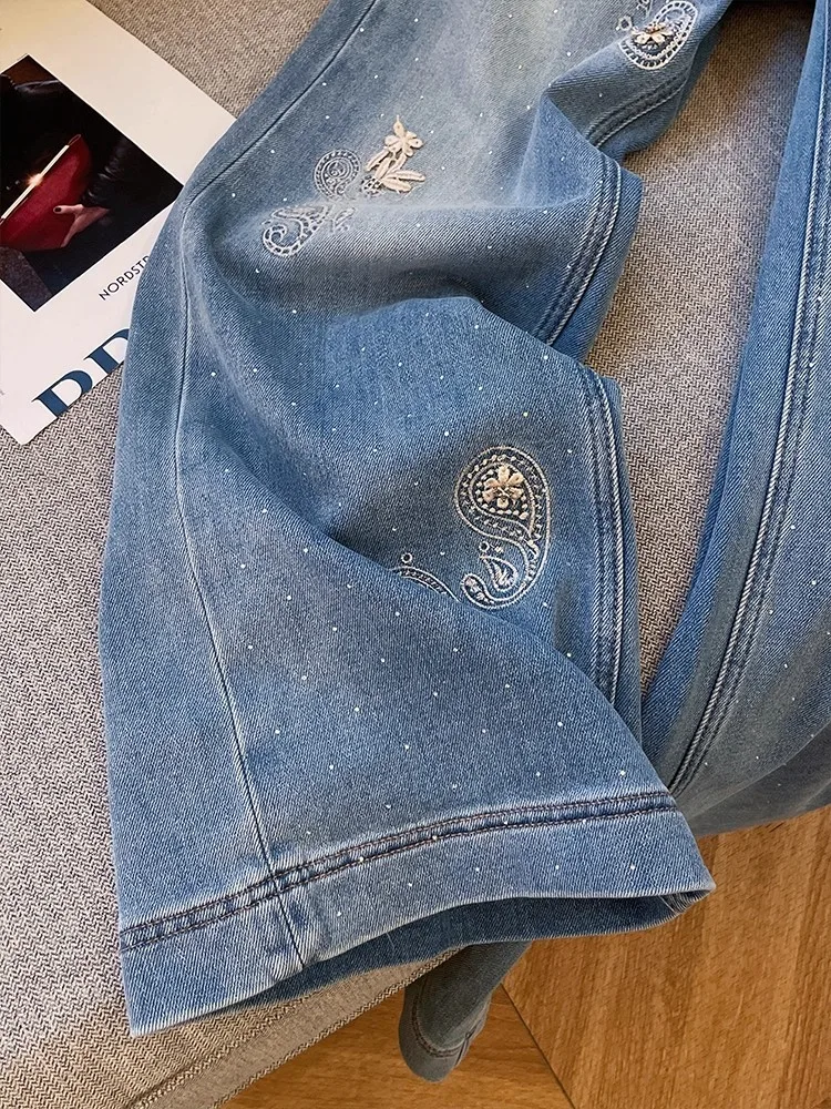 Nuovi jeans da donna con ricamo floreale di design Fodera in pile invernale Pantaloni caldi a gamba larga Pantaloni lunghi casual Pantaloni in denim streetwear