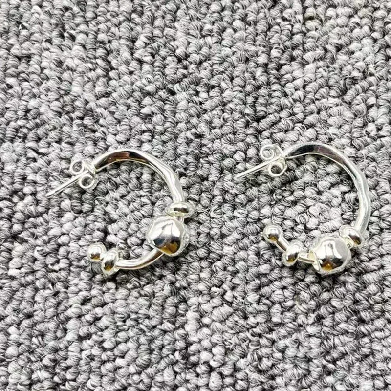 Best Creative Spanish Original Fashion Simple Electroplated 925 Silver Color Gold Hoop Earrings Day Jewelry Gift Fit Unode50