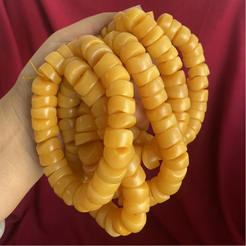 , cow bone, set of 108 Buddhist beads paired with a neck and chicken fat yellow plain bead