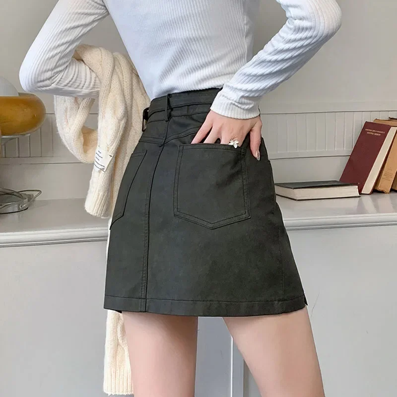 Mini jupe trapèze taille haute en cuir PU pour femmes, jupes courtes décontractées avec ceinture, mode automne et hiver 2024