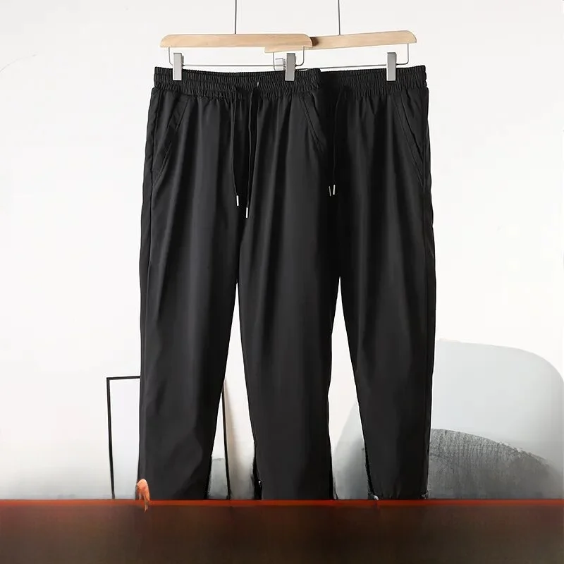 

Men's Thiened down Pants Elastic Waist Pred Glue Filled Winter Faionable Warm Long Trousers Youth Casual Color