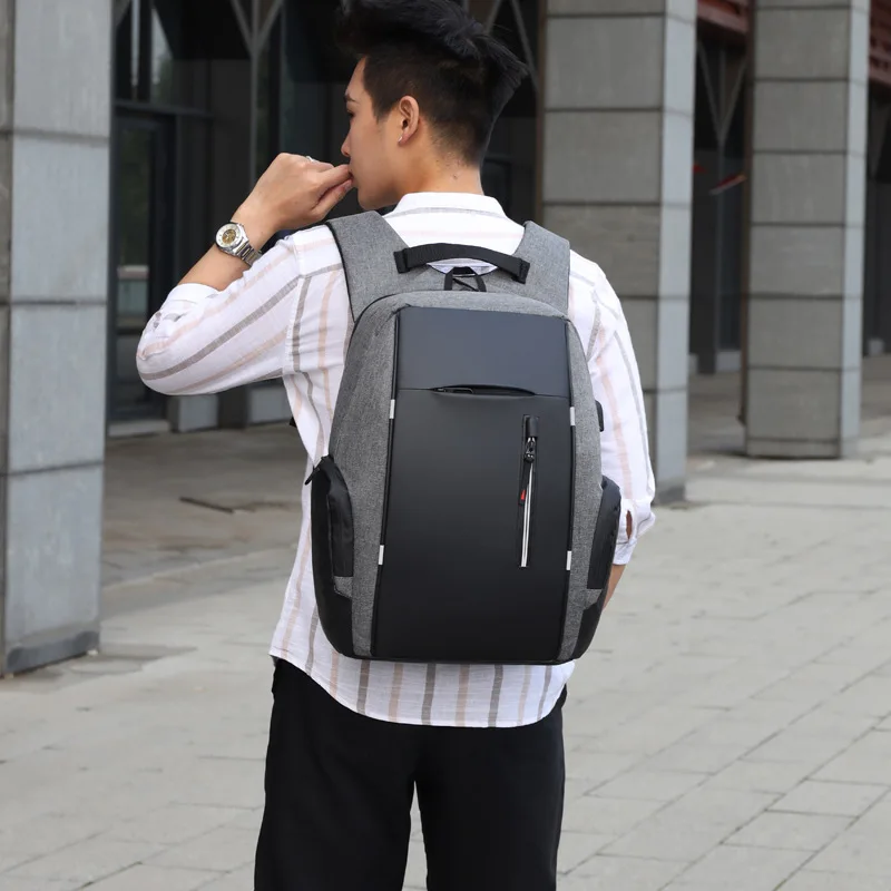 Europe and the United States backpack men's business laptop bag multifunctional rechargeable USB large-capacity backpack.