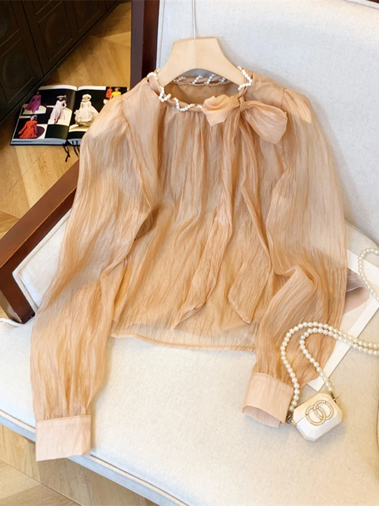 Autumn New Elegant Lady Solid Color Long Sleeved Loose Chiffon Shirt French Fashion Women's Woven Pearl Round Neck Tied Shirt