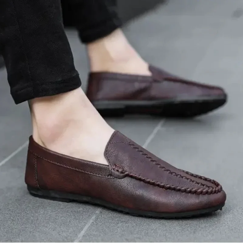 Mocassini da uomo firmati scarpe Casual in pelle di grandi dimensioni mocassini di marca di lusso Slip On Driving Shoes mocassini alla moda leggeri