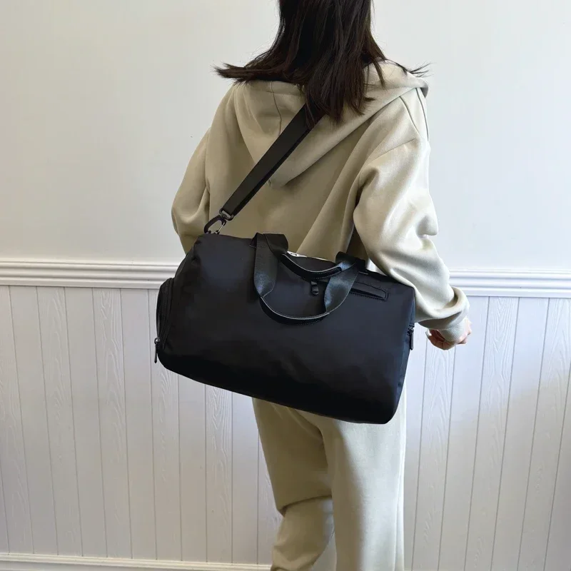 Sacs de voyage en toile solide avec fermeture éclair pour femme, grande capacité, nouveau style décontracté, fourre-tout polyvalent, haute qualité, sac lancé par les jeunes