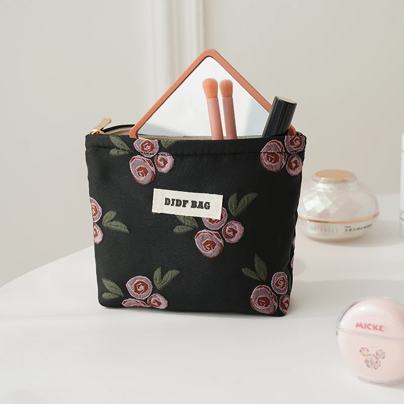 Borsa cosmetica da donna piccola rosa nera portatile di grande capacità rossetto borsa portaoggetti per assorbenti igienici portamonete per pendolari