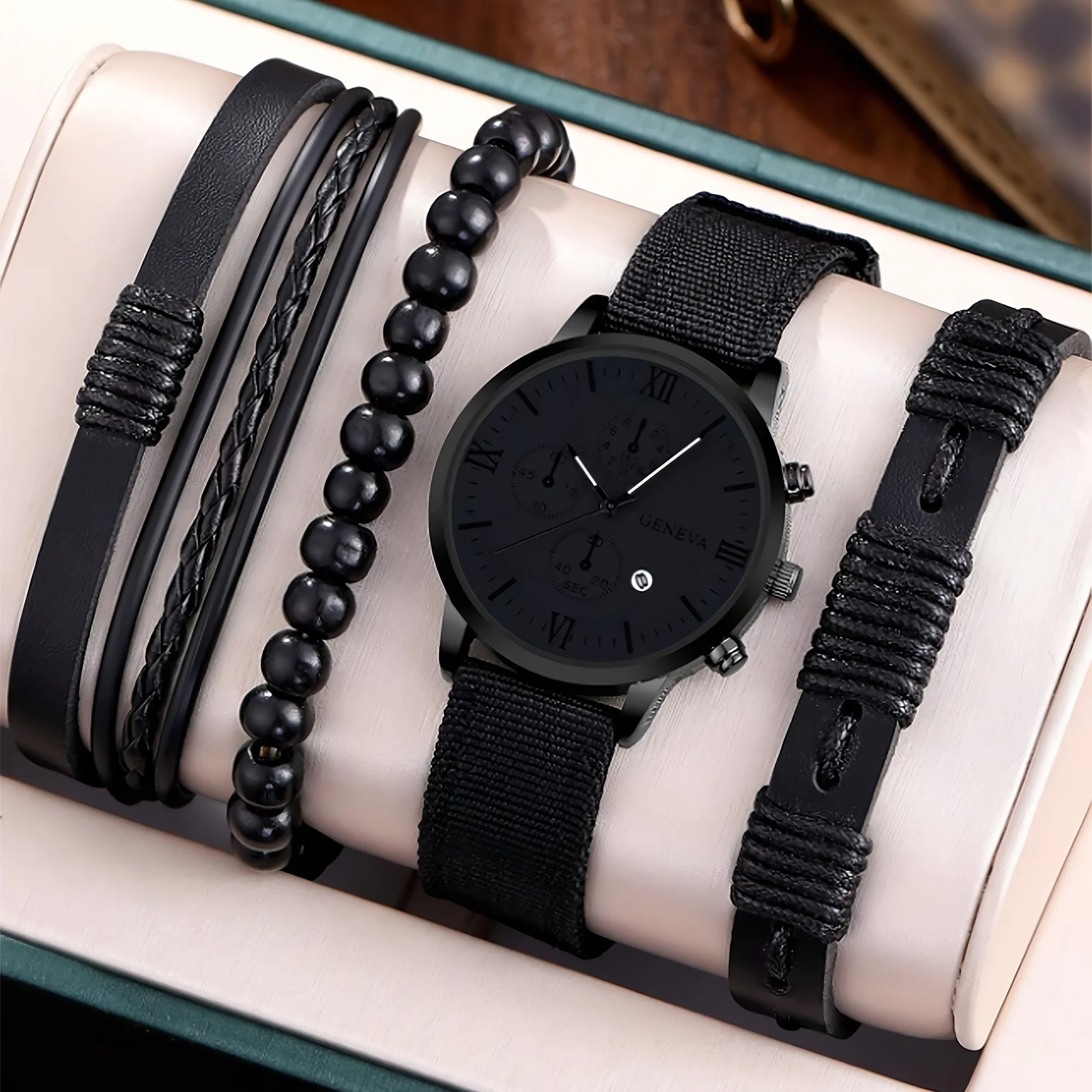 

4pcs Black Sports round watch calendar indicator quartz watch with nylon strap and 3 bracelets the best choice for father gifts