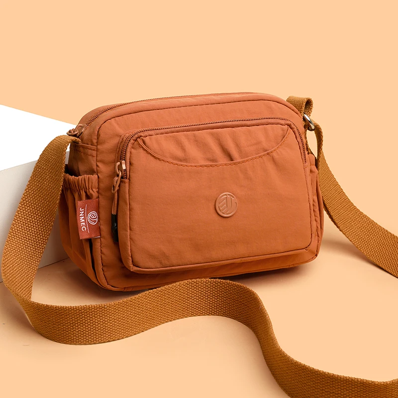 2025 Nouveau Jialongshi Sac à bandoulière simple pour femme à la mode et polyvalent, sac à bandoulière décontracté et simple, tissu en nylon imperméable