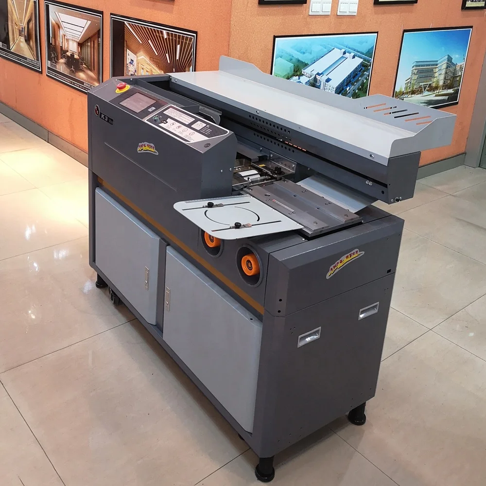 آلة تجليد الكتب ذات الغلاف الصلب للمنتجات المبتكرة البسيطة التي تشتري عبر الإنترنت في الصين