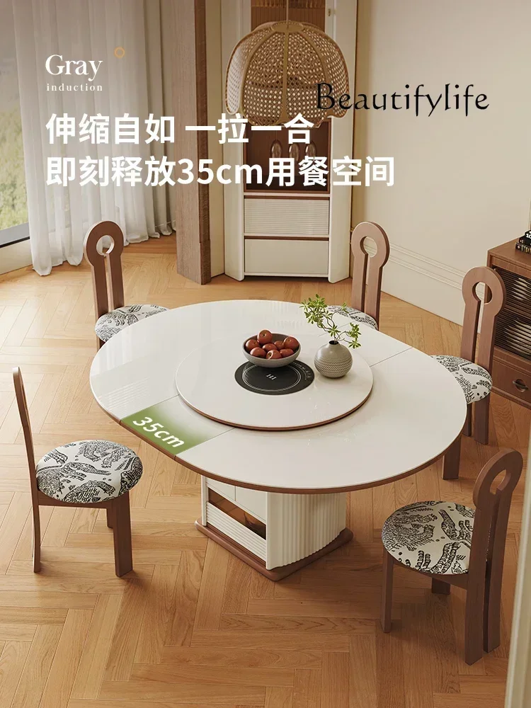A Retractable Deformable Round Table With Induction Cooker Hot Pot Integrated Medium And Ancient Rock Slab Dining Table