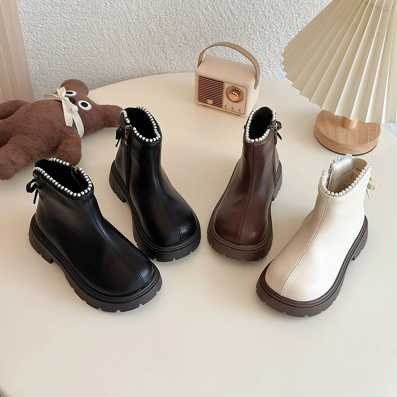 

Детские кожаные сапоги с простыми бантами на спине. Детские сапоги принцессы с круглым носком. 2026. Новые модные короткие сапоги для девочек с мягкой подошвой.