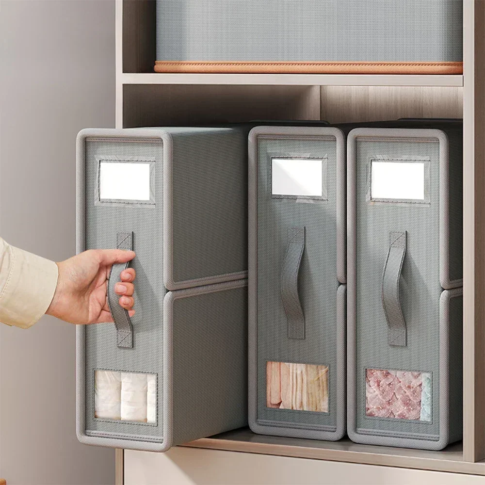 

Набор из четырех коробок для хранения из нетканого материала для одежды, постельного белья и аксессуаров.