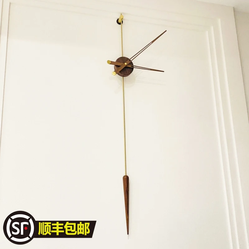 

Modern minimalist living room Spanish wall clock Minimalist decorative creative art clock Personalized home wall mute watch