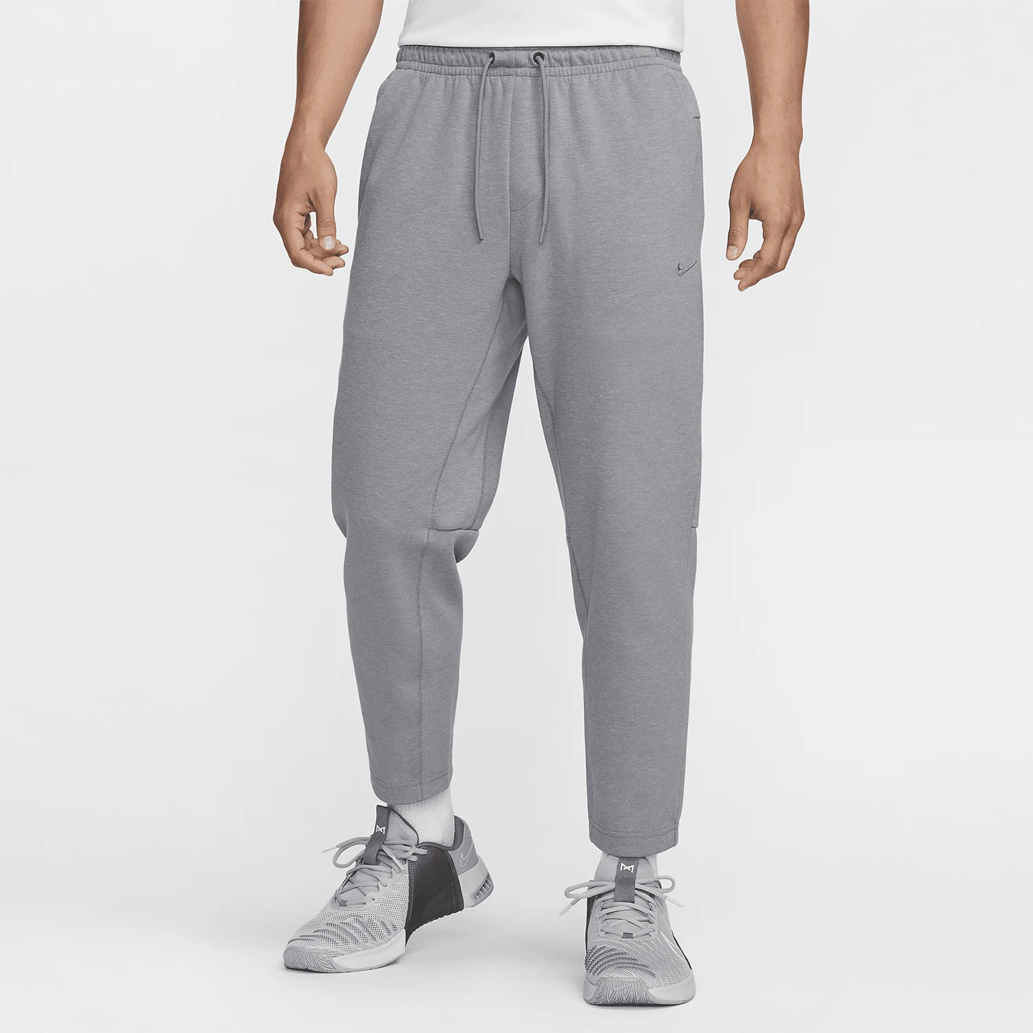 

Официальные мужские вязаные солнцезащитные брюки Nike Primary Dri-FIT FZ5851-065