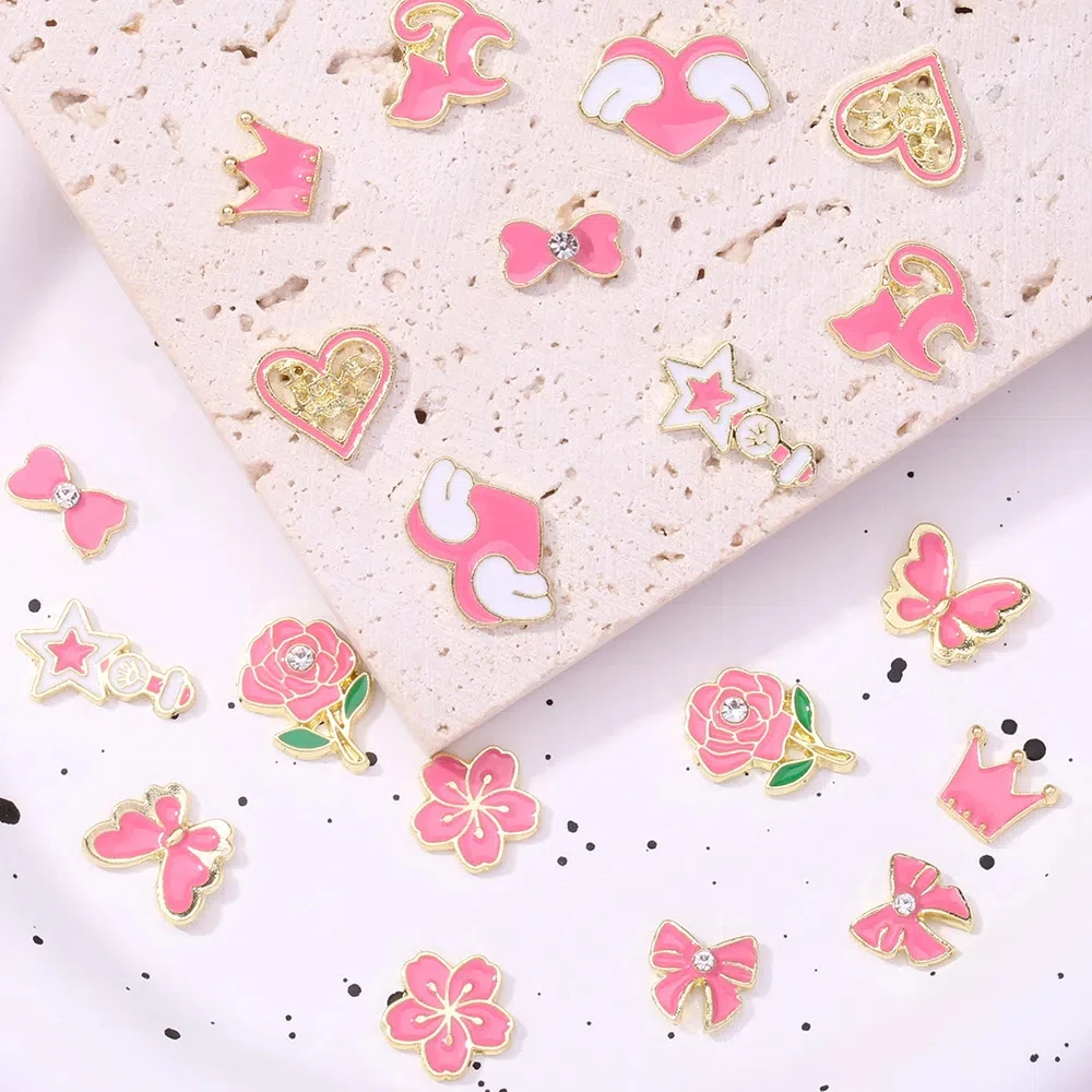 10 قطع الأزياء الوردي المينا الأظافر سحر زهرة القلب Bowknot سبيكة DIY مسمار الزينة جميلة الجناح المعلقات مسمار الفن مجوهرات