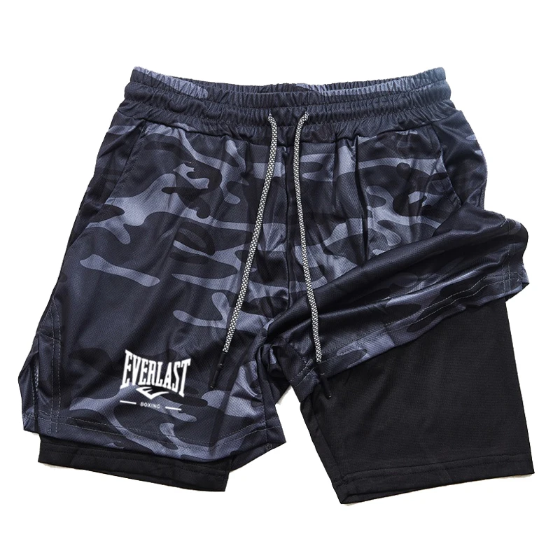 The printed sport shorts feature an elastic waistband and a multi-functional design that can accommodate a mobile phone.