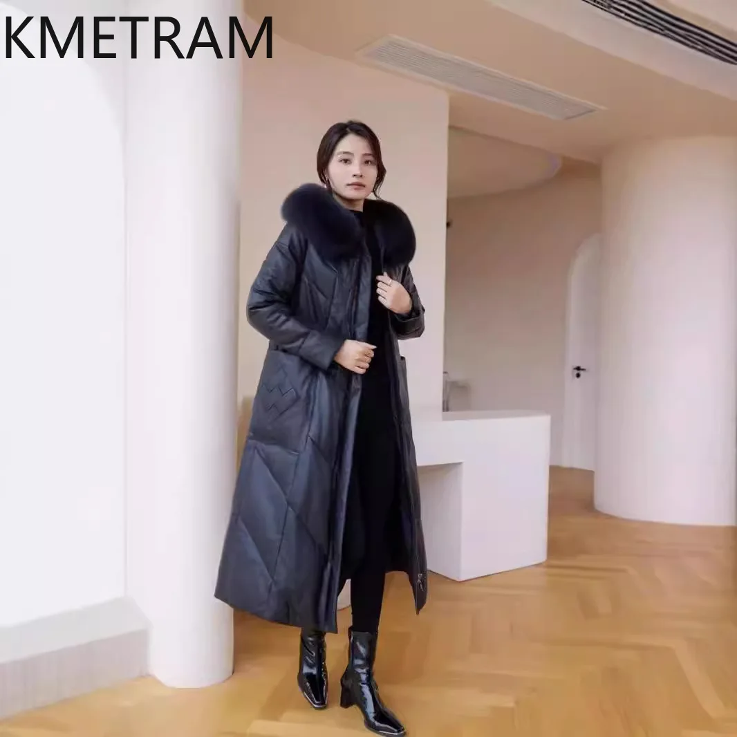 Piumino in pelle di pecora al 100% da donna Cappotti lunghi in vera pelle di alta qualità con cappuccio Collo in pelliccia di volpe 2025 Abiti invernali