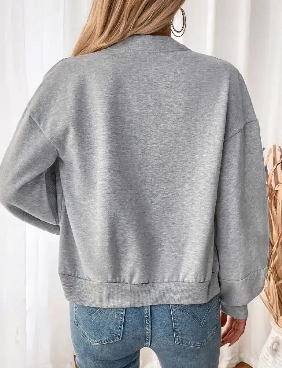 ゆったりとした女性の春の無地ラウンドネックジッパーフロントランタンスリーブベースボールジャケットは、スポーツや運動に適しています。