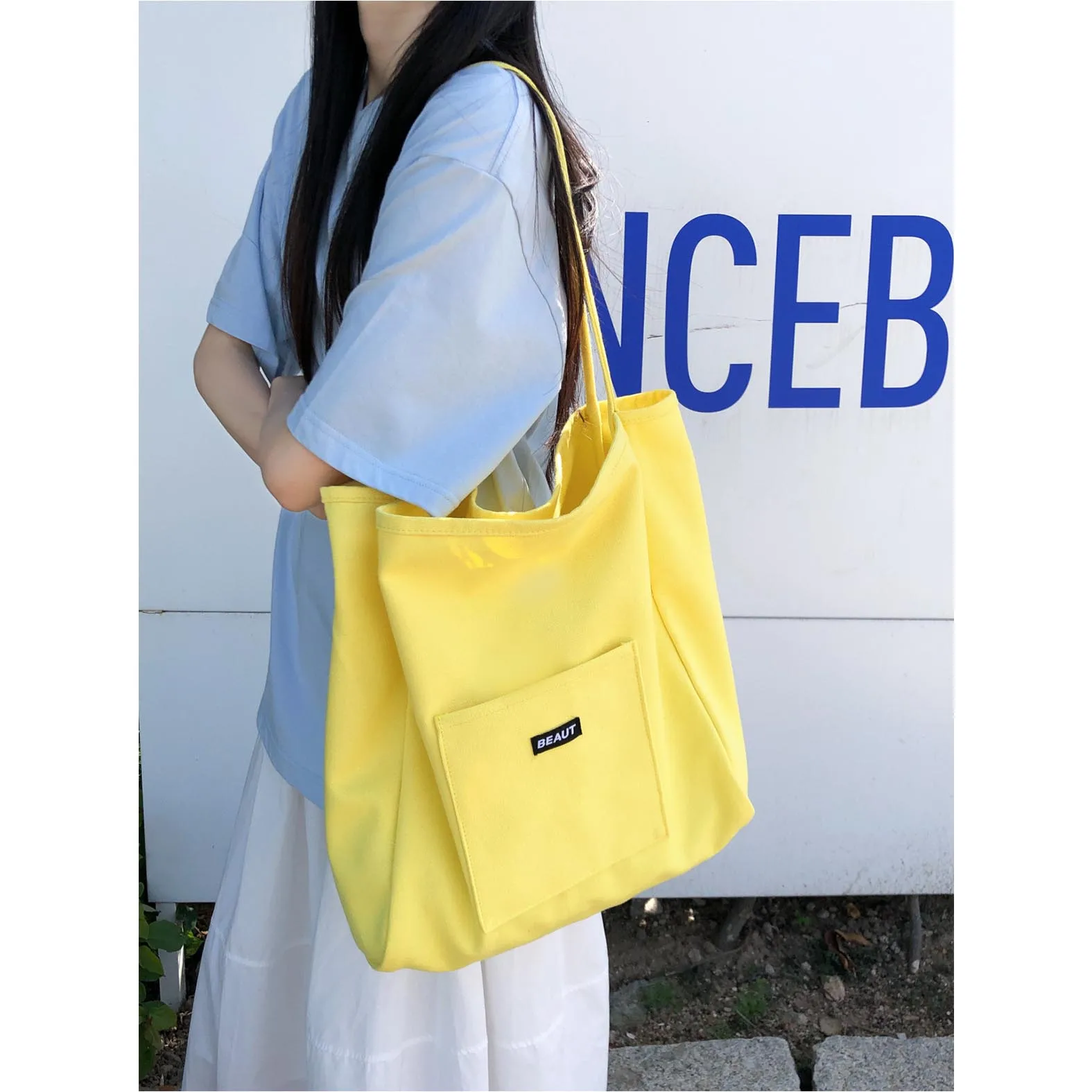 

Solid color letter canvas bag 2025 new ins large capacity simple trendy shoulder bag Korean version artistic tote bag