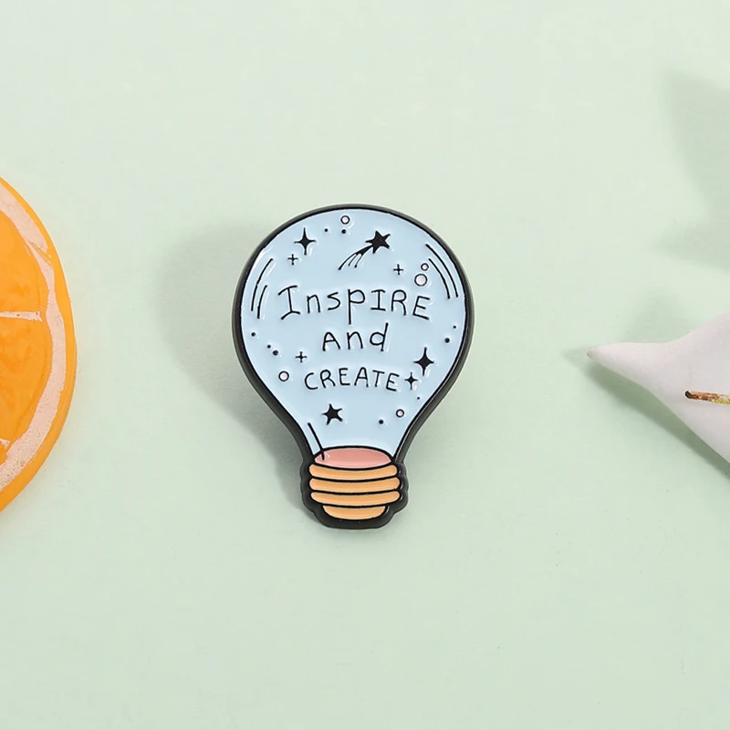 

Cartoon Light Bulb Enamel Pin Inspirational Quote Inspire And Create Brooch Lapel Badge Fashion Jewelry Gift for Friends