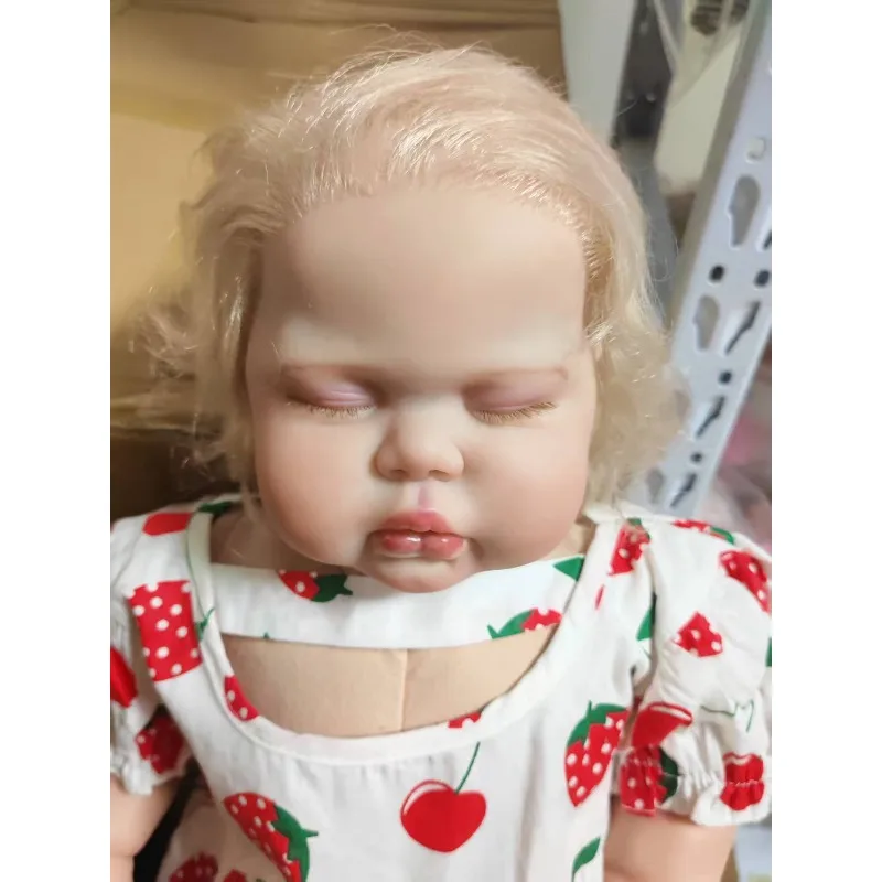 

24Inch 60cm Lifelike Sleeping pickle in Soft Cloth Body Reborn Toddler with Hand rooted Blond Hair