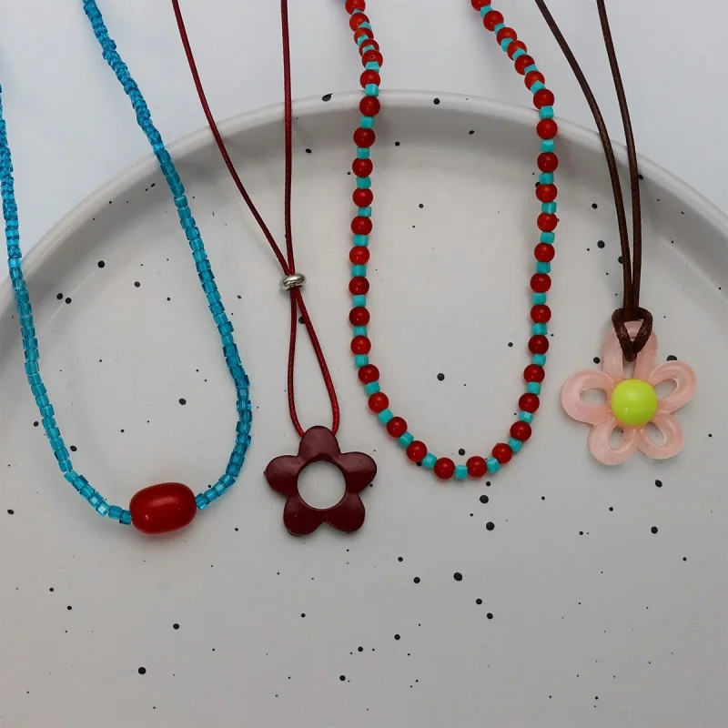 4Pcs Bohemian-style floral beaded necklace set with colored hollow flower pendants, waxed string beading, Y2K women's necklace