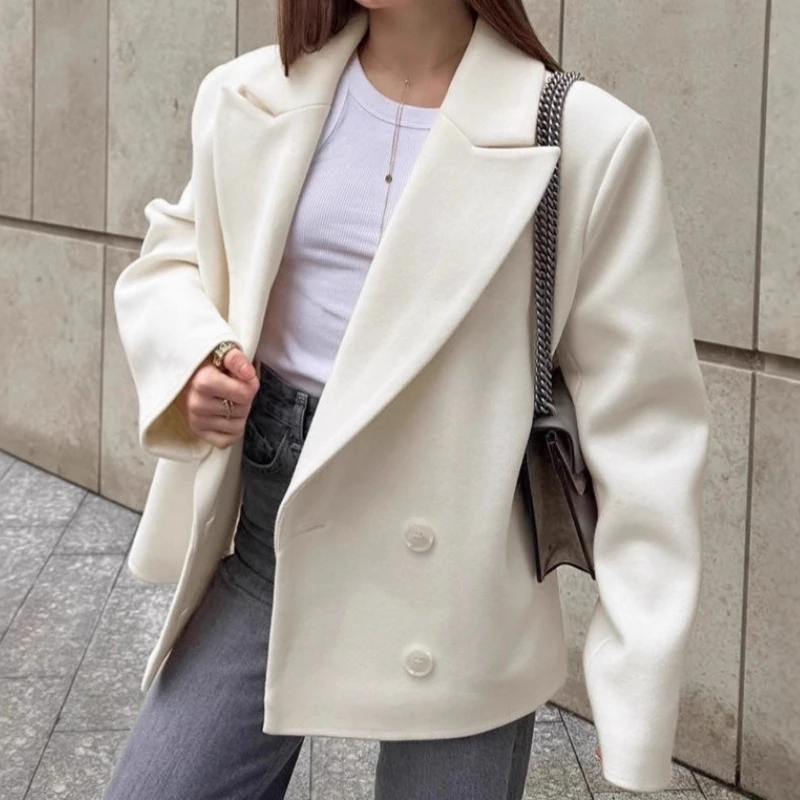 Giacca in lana beige stile denaro vintage francese da donna 2025 Abito doppiopetto allentato di media lunghezza con risvolto invernale