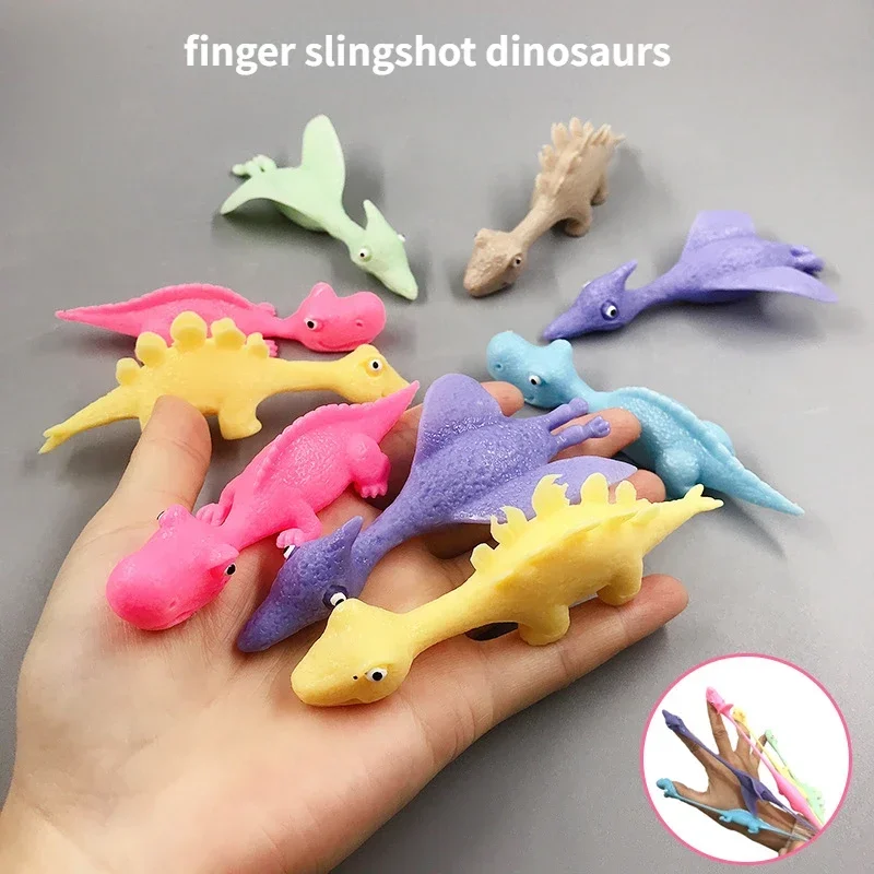 

Creative finger slingshot dinosaurs Decompression toys Slingshot target dinosaur sleazy sticky wall venting toy Christmas Gifts