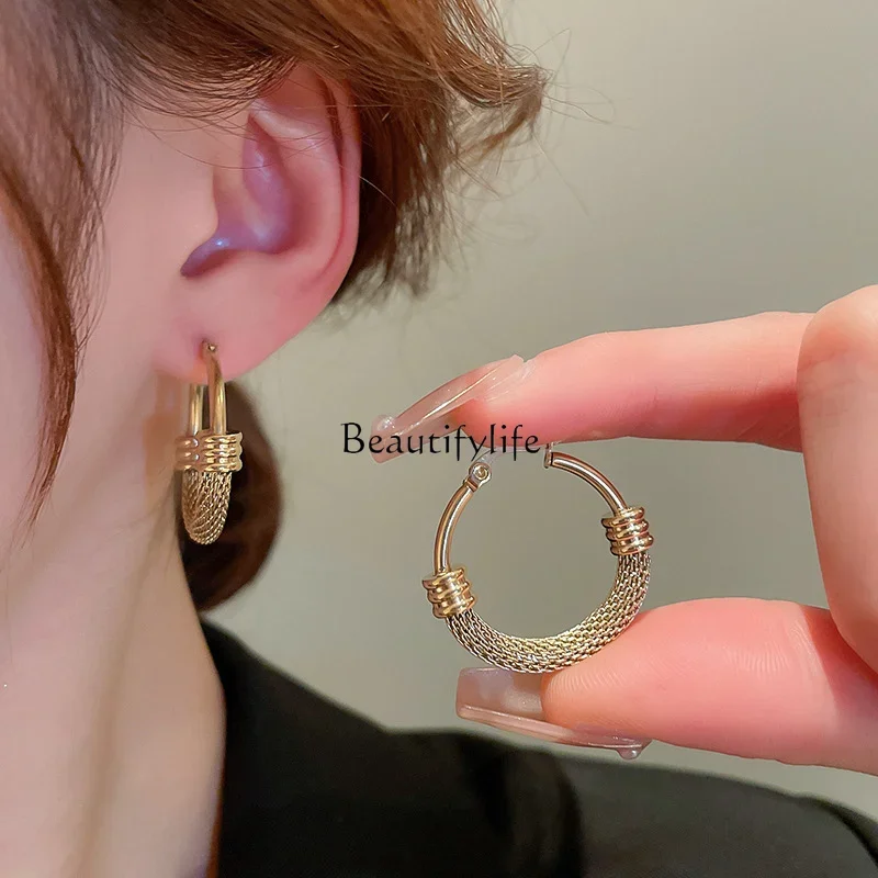 

Korean titanium steel hollow round ear buckle personality light luxury fashion temperament simple earrings women