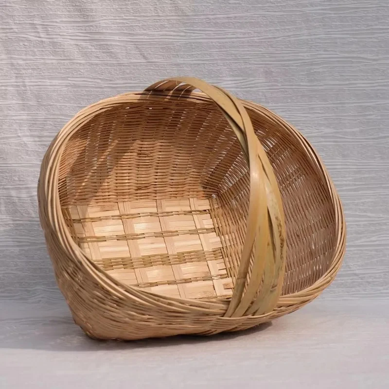 Handmade woven fruit and vegetable storage basket with handle