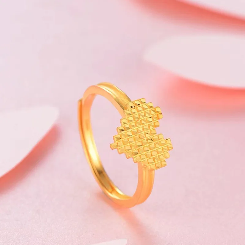 AU999 خاتم شوكولاتة على شكل قلب ذهبي عيار 24 قيراط |   مينا متدرجة - شوكولاتة مطلية - قلب منغم، لؤلؤي - حواف مرصعة، رقيقة ونبيلة