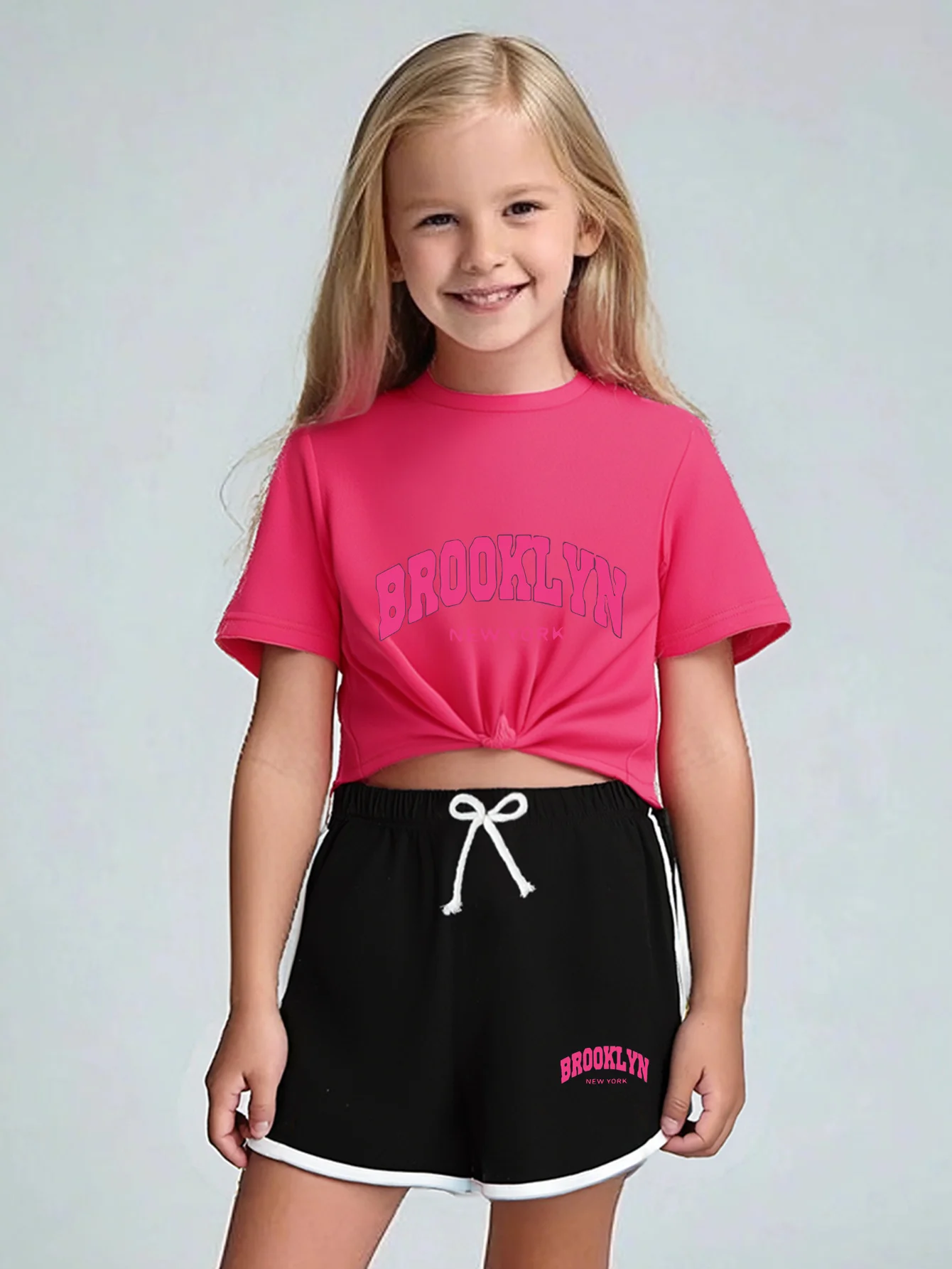 

Summer girl two-piece lace up T-shirt+shorts set, casual and comfortable, simple and cute, multifunctional, creative English .