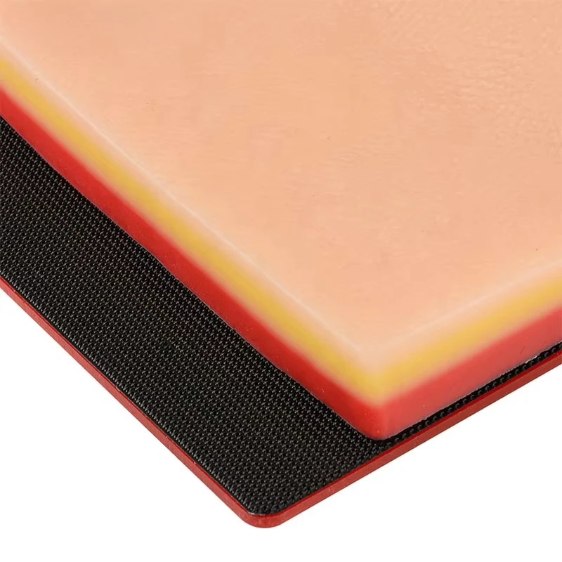 Wound suturing practice pad with hook and loop tissue tension device for practice