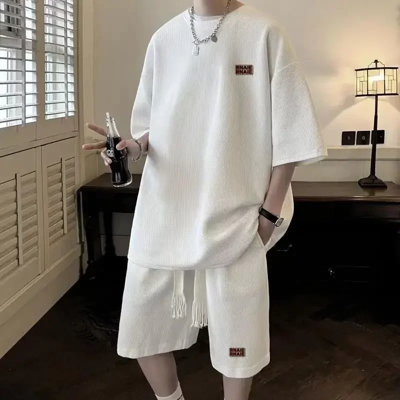 

Men's Set Solid Color Loose Round Neck Short Sleeved Drawstring Shorts Two-piece Set Men's Summer Sportswear Fitness Sportswear