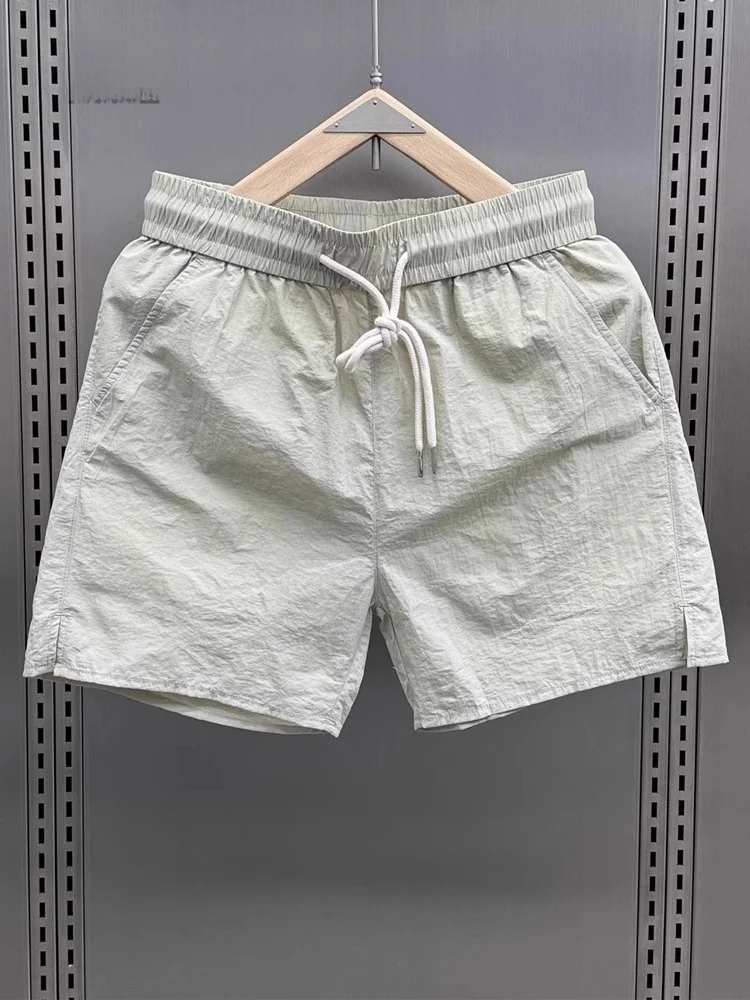 

Trendy Ice Silk Casual orts Men's Summer New Qui Dry Sports Beach Five-Quarter Pants Loose Fit Elastic Waist Busin Casual