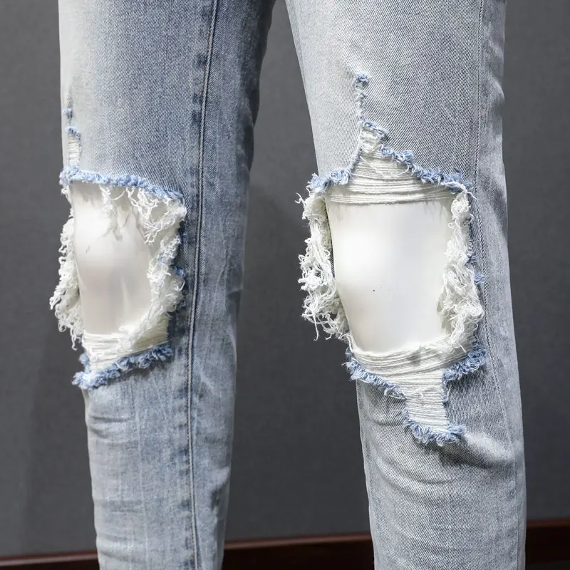 Fashionable new men's light blue jeans, washed, nostalgic, perforated, white patch, elastic, slim fit, painted jeans, hip-hop br