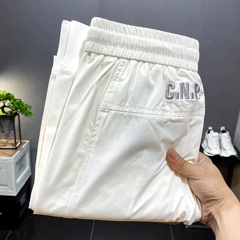 

Embroidered Men's Summer 2024 New Patchwork Elasticized High-waisted Pocket Letter Fashion Solid Loose Sports Casual Pants