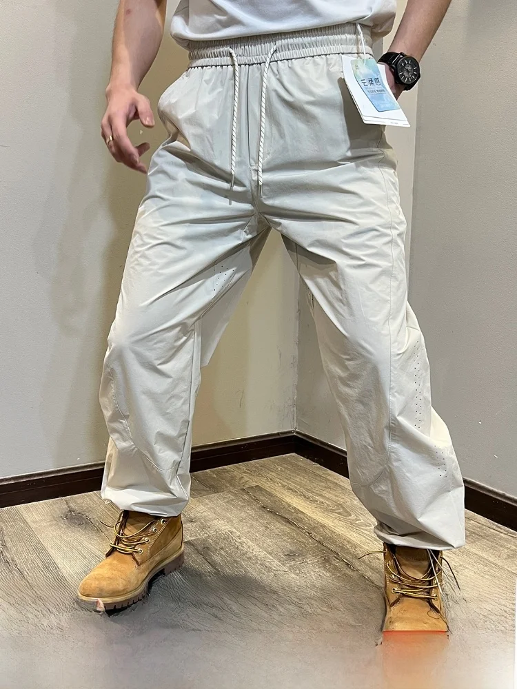 

Функциональные ветрозащитные солнцезащитные брюки с лазерной перфорацией, тонкие повседневные брюки, дышащие 3D пошив, весна-лето, молодежные Sle