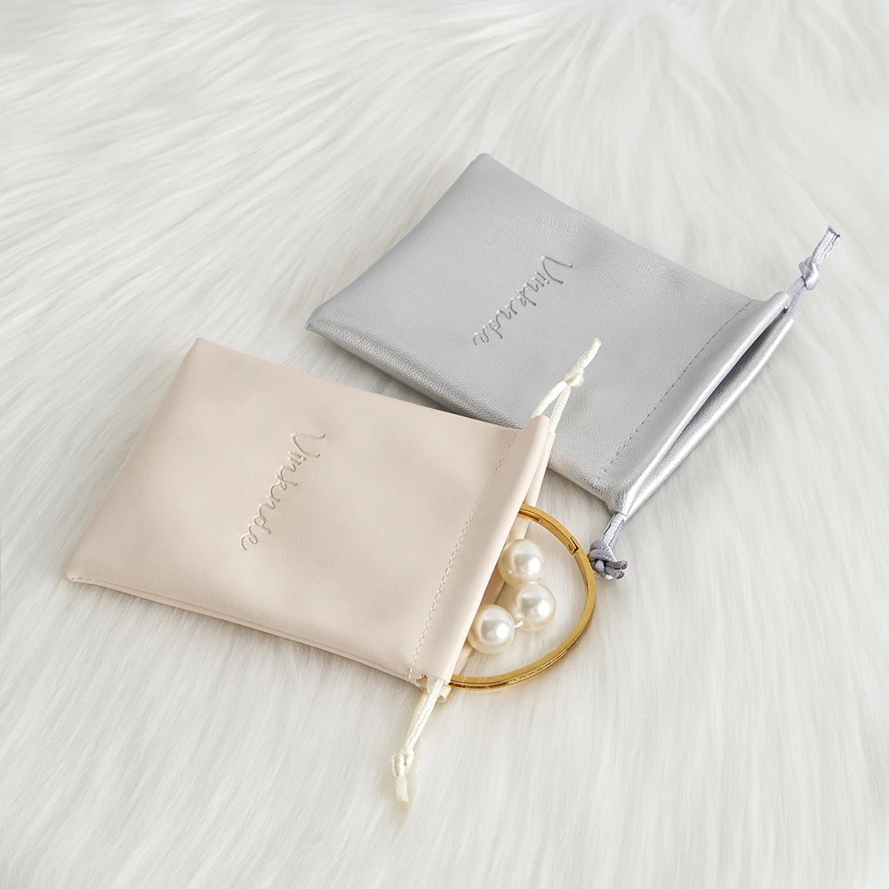 50 قطعة أكياس الرباط الجلدية بو هدايا الزفاف هدية أكياس تغليف الحلوى شعار مخصص مجوهرات العطور أحمر الشفاه المنظم أكياس